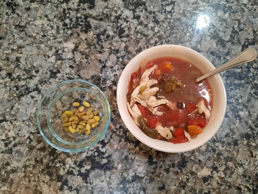 second nature - raw pistachios and a chicken vegetable soup