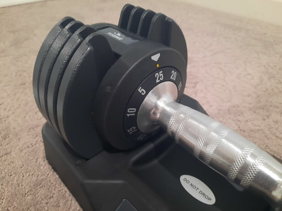 FLYBIRD adjustable dumbbells in the tray