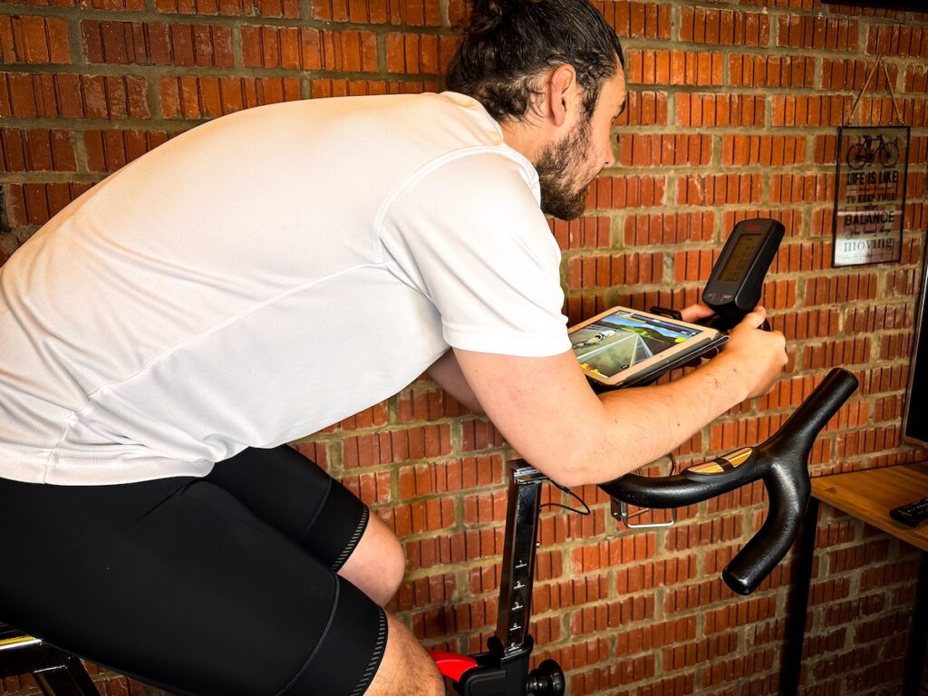 riding a spin bike with cyclego app